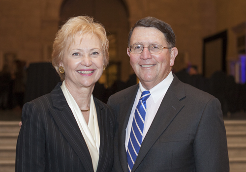 Man and woman smiling at camera