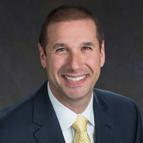 Headshot of smiling man
