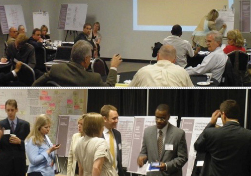 People pointing at presentation and discussing